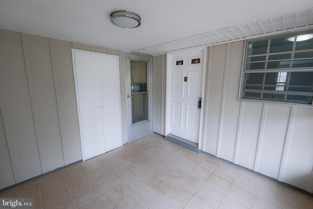 doorway to property featuring a patio area