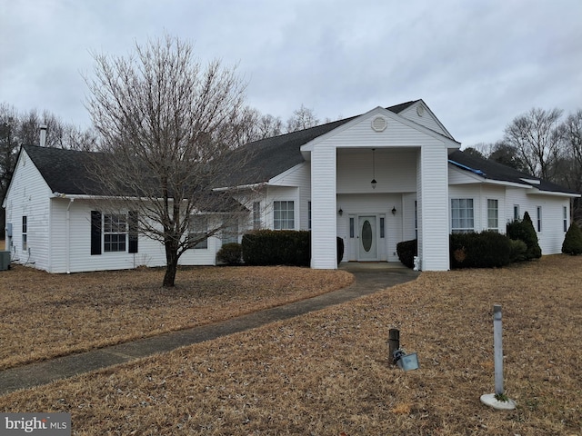 view of front of property featuring cooling unit