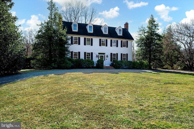 view of front of home with a front yard