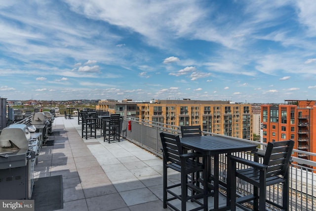 view of patio with a city view