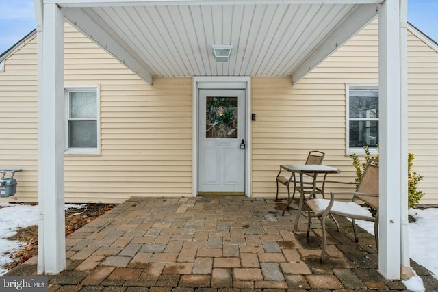 doorway to property featuring a patio