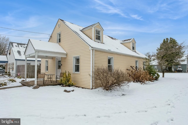 view of snow covered property