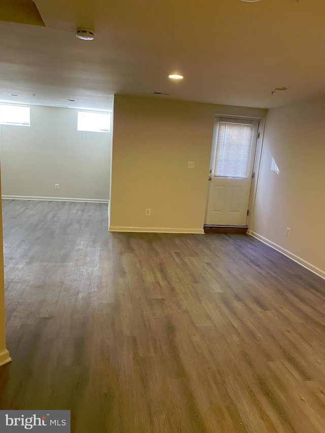 unfurnished room featuring hardwood / wood-style floors