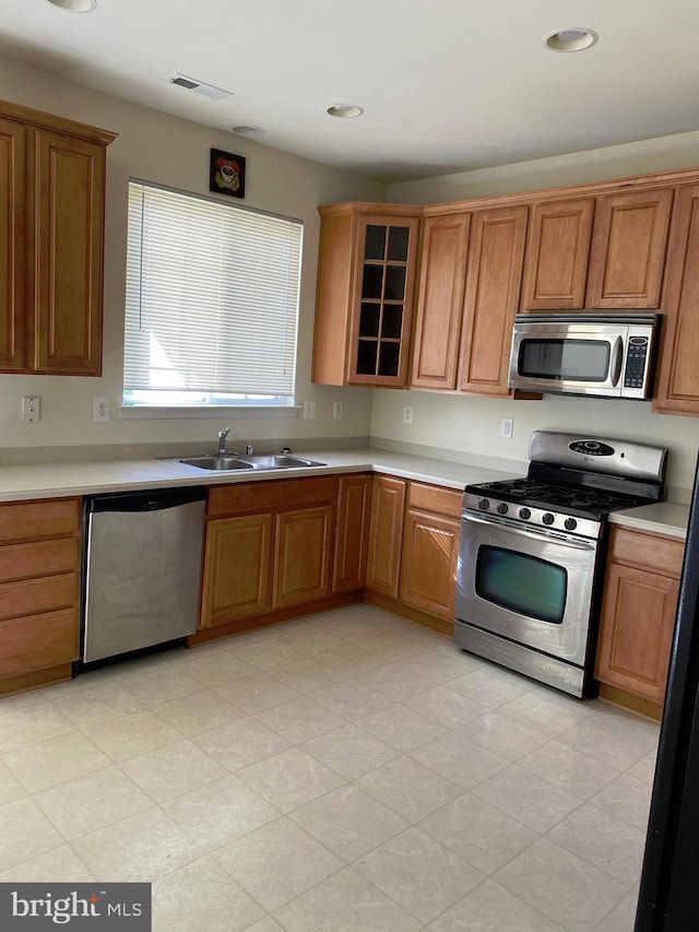 kitchen featuring appliances with stainless steel finishes and sink