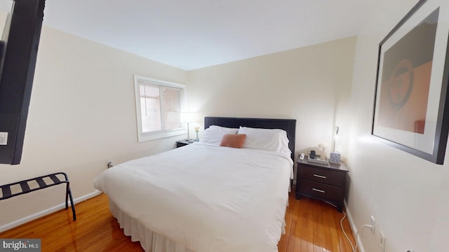 bedroom featuring light hardwood / wood-style floors