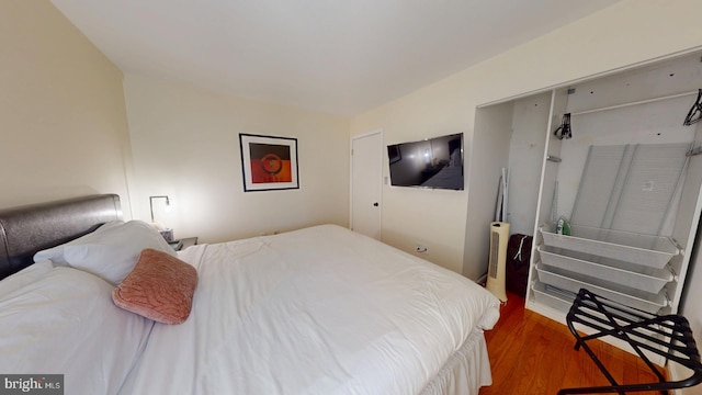 bedroom featuring hardwood / wood-style floors