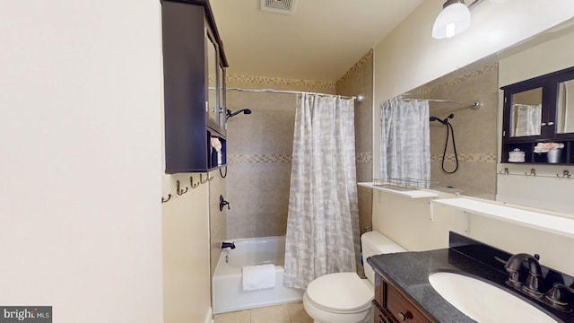 full bathroom with vanity, tile patterned flooring, shower / bath combination with curtain, and toilet