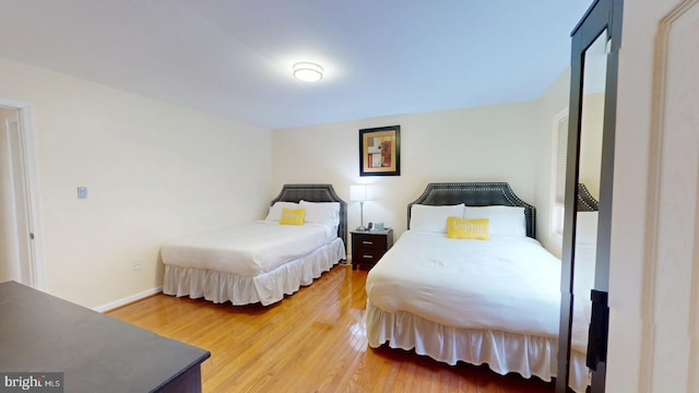 bedroom featuring hardwood / wood-style floors