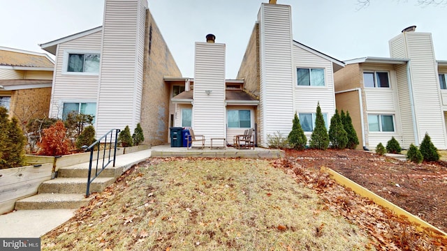 rear view of property with a patio