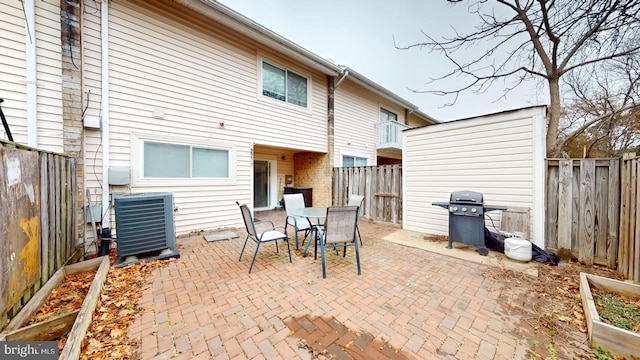 view of patio featuring area for grilling and central AC