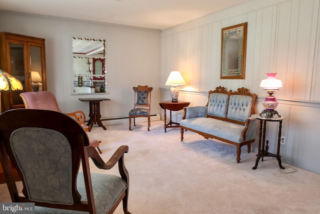 sitting room with carpet floors and baseboard heating