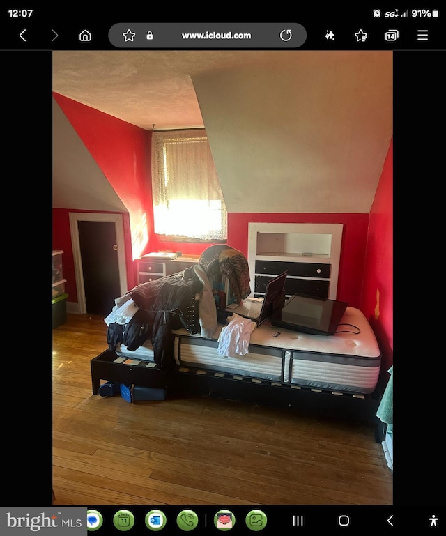 bedroom featuring wood-type flooring