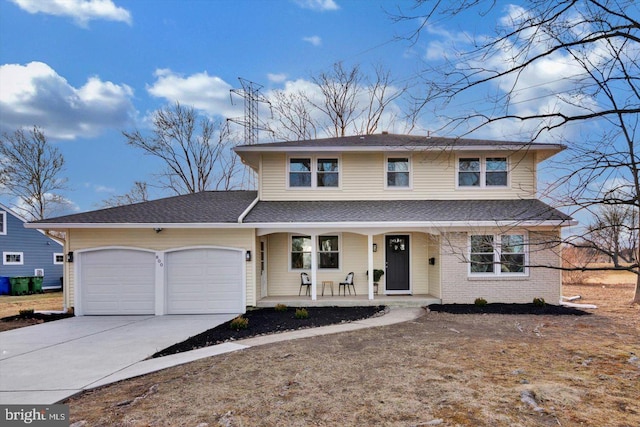 front facade with a garage and a porch