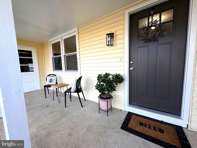 entrance to property with a porch