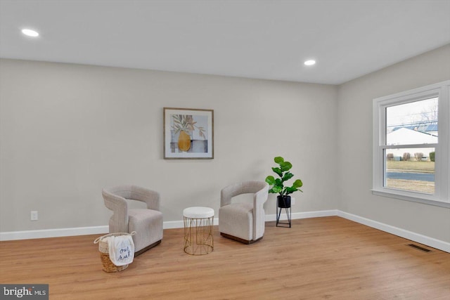 living area featuring light wood-type flooring