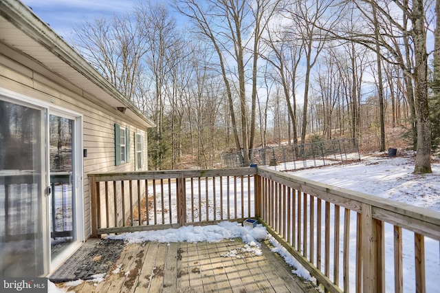 view of snow covered deck