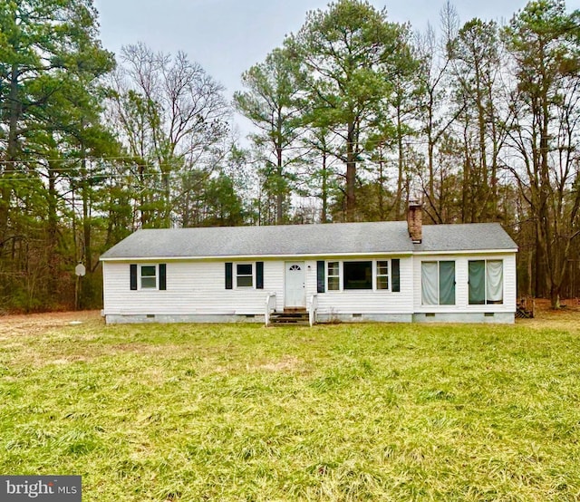 view of front of house with a front lawn