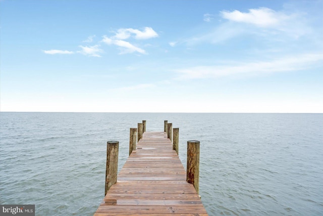 view of dock with a water view