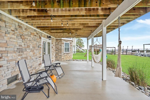 view of patio / terrace with fence