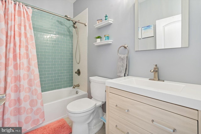 full bathroom featuring vanity, shower / tub combo, and toilet