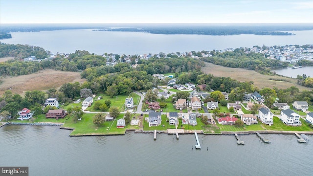 aerial view with a water view and a residential view