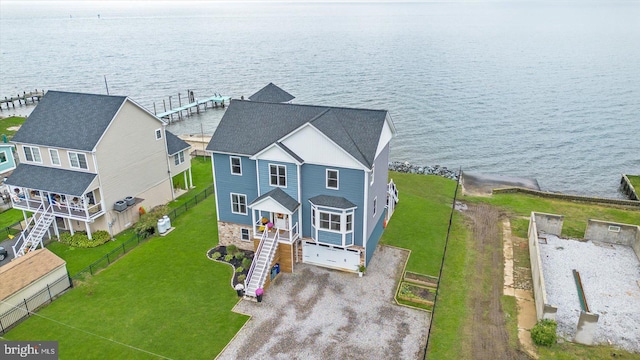 bird's eye view with a water view