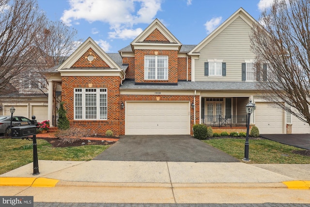 view of front facade featuring driveway, a porch, a shingled roof, a garage, and brick siding