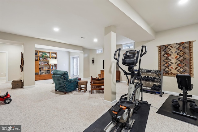 exercise room with recessed lighting, baseboards, and carpet flooring