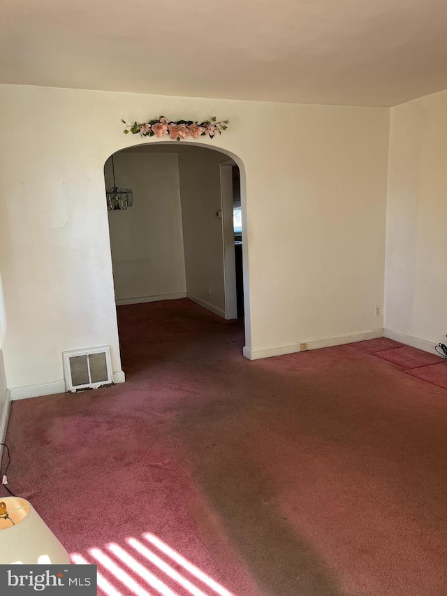 spare room with carpet floors