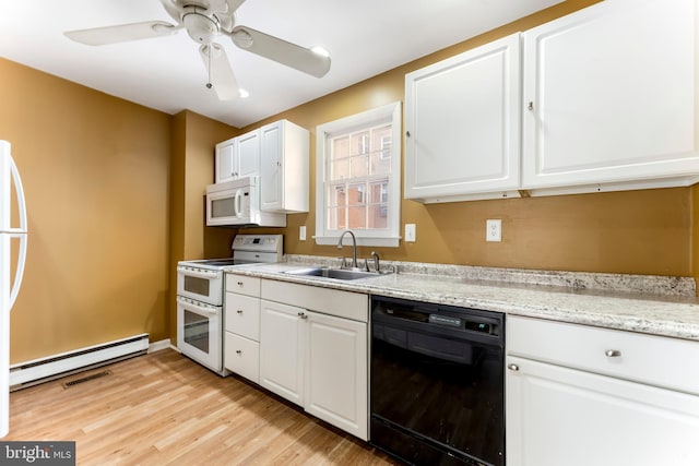 kitchen with white cabinetry, sink, a baseboard heating unit, light stone counters, and white appliances