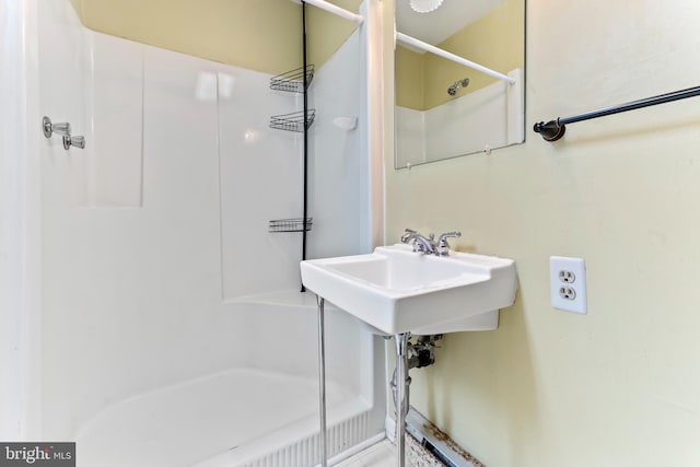 bathroom with walk in shower