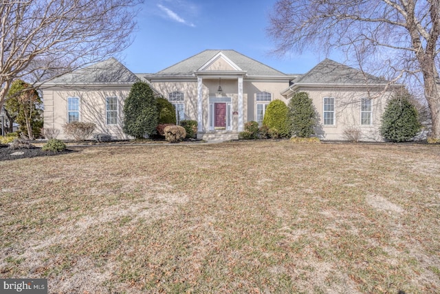 view of front of house with a front lawn