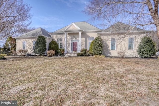 view of front of home with a front lawn