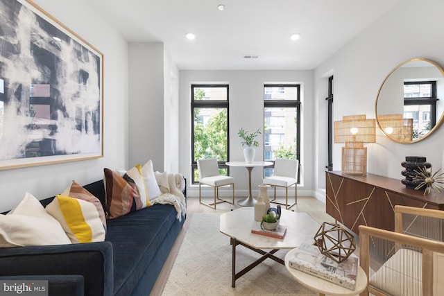 living room with light hardwood / wood-style floors