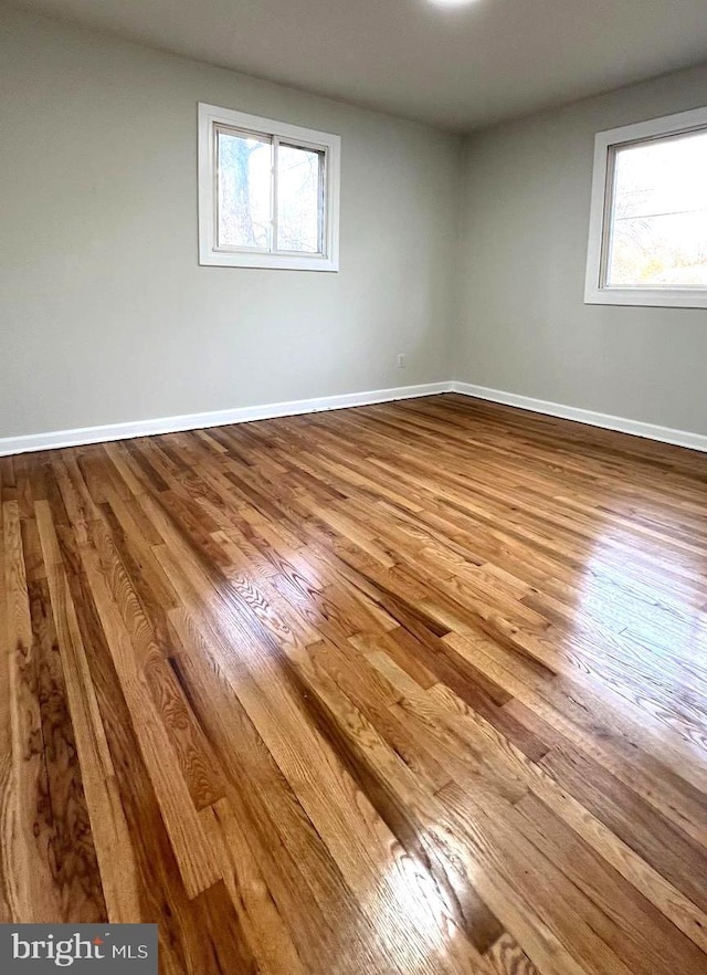 empty room with light wood-type flooring