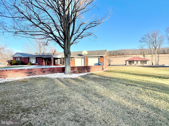 exterior space featuring a front lawn