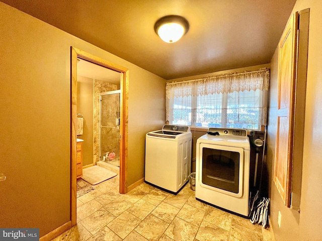 laundry area featuring washer and clothes dryer