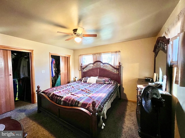 bedroom featuring multiple closets, ceiling fan, and dark colored carpet