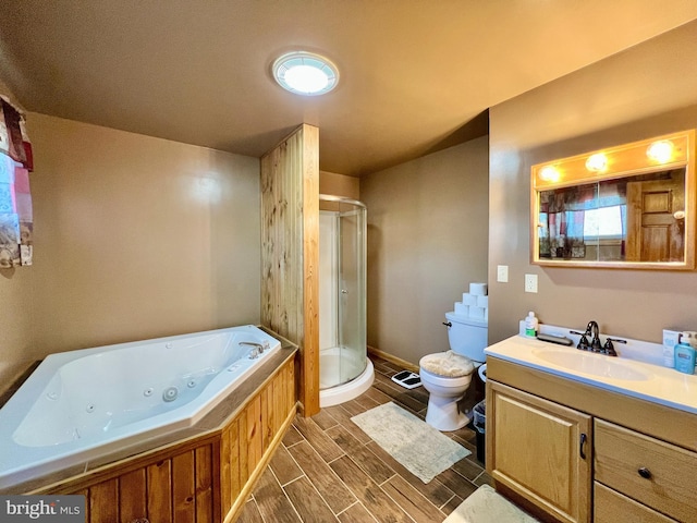 full bathroom with independent shower and bath, vanity, and toilet