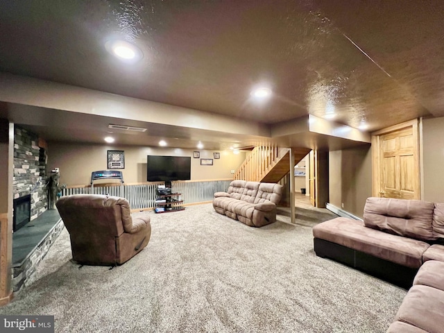 living room with a baseboard radiator and carpet floors