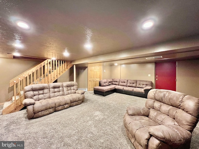 home theater with carpet flooring and baseboard heating