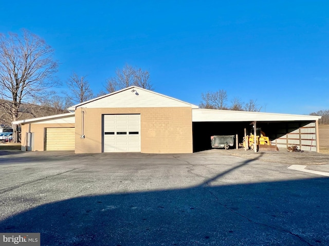 garage with a carport