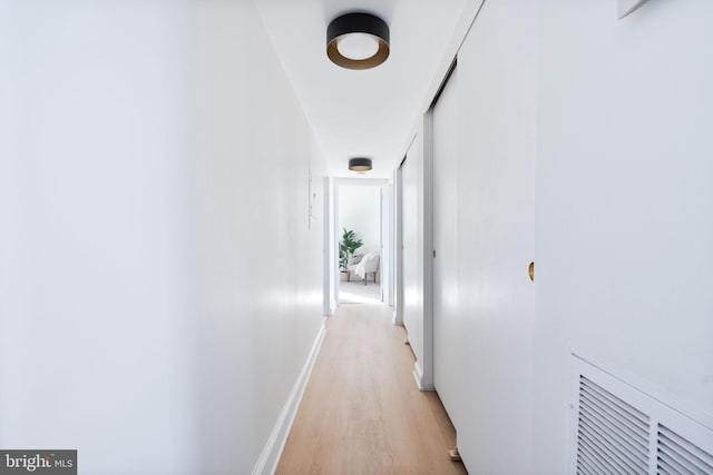 hall featuring light hardwood / wood-style flooring