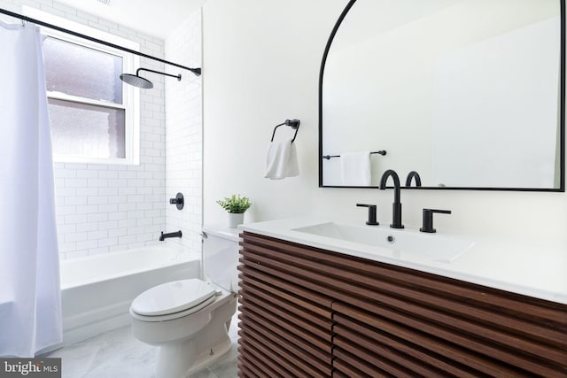 full bathroom featuring shower / bath combo, vanity, and toilet