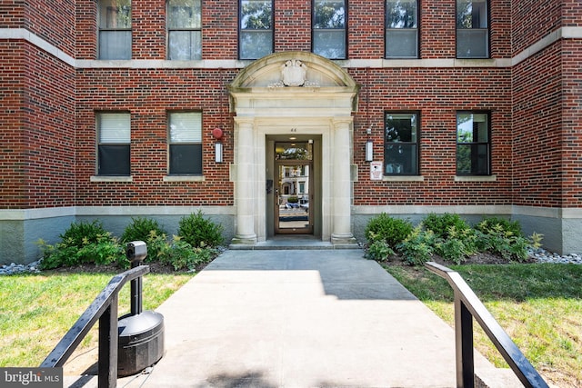 property entrance with a yard