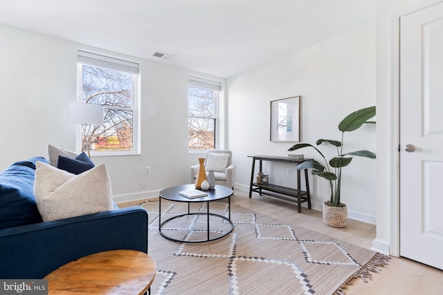 sitting room with light wood-type flooring