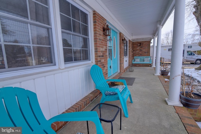 view of patio featuring a porch