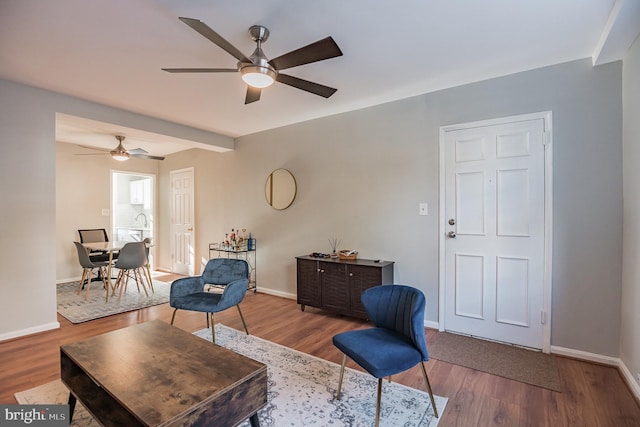 interior space featuring ceiling fan and wood-type flooring