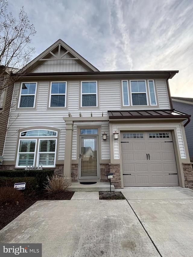 view of front of property featuring a garage