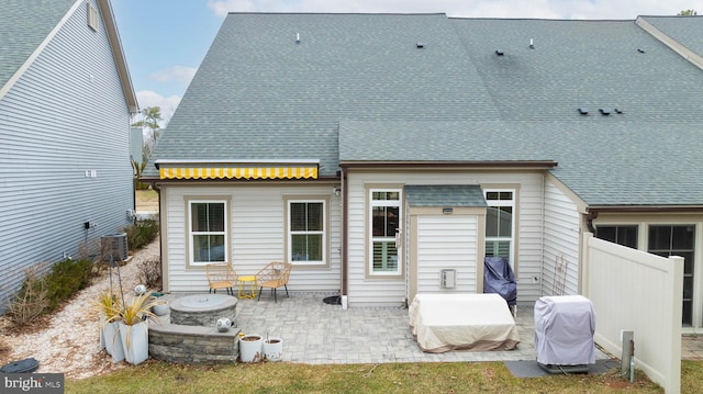 back of house featuring a patio and central air condition unit